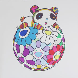 Atop a Ball of Flowers, a Panda Cub Sleeps Soundly